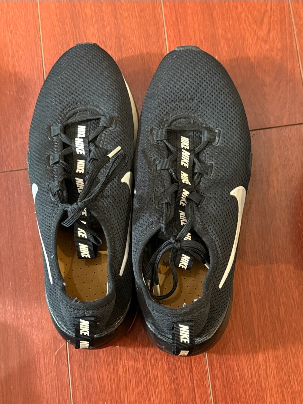 Nike Men’s Black Sneakers with White Swoosh